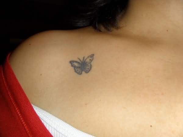 Tiny Simple Black Butterfly Tattoo On Collarbone For Women