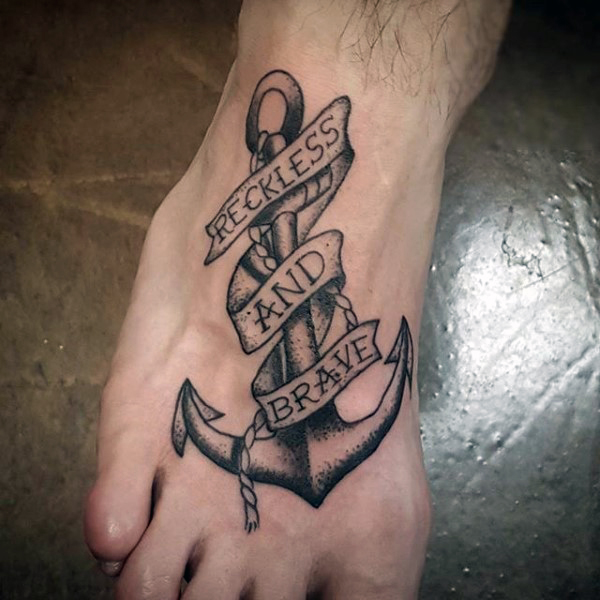 Traditional Anchor Lettering Banner Tattoo On Foot