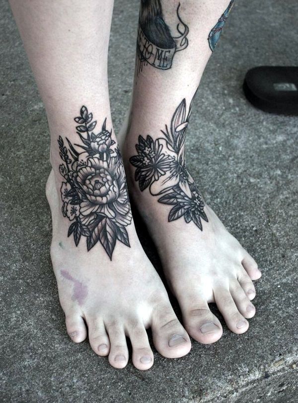 Traditional Black And White Flowers Tattoos On Both Foots