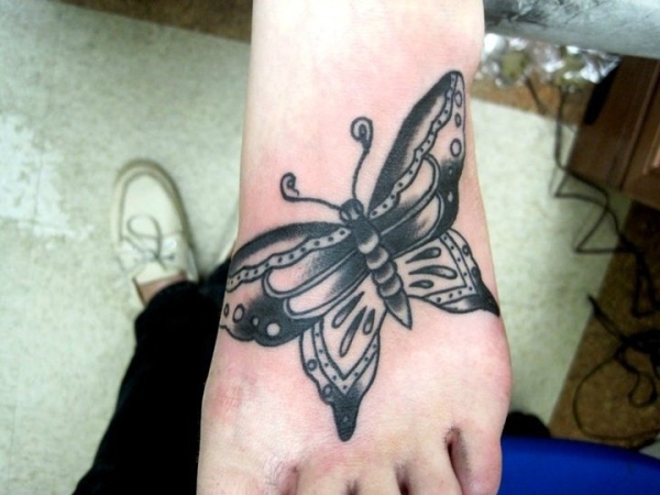 Traditional Black Butterfly Tattoo On Foot