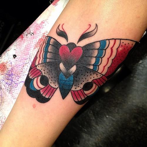 Traditional Butterfly Heart Tattoo On Forearm