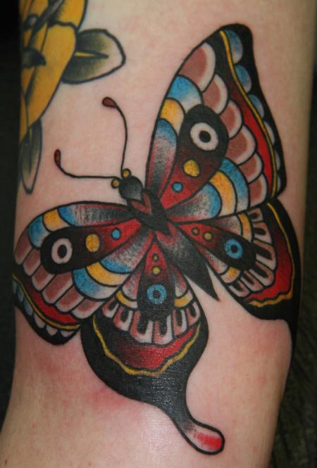 Traditional Butterfly Tattoo On Arm