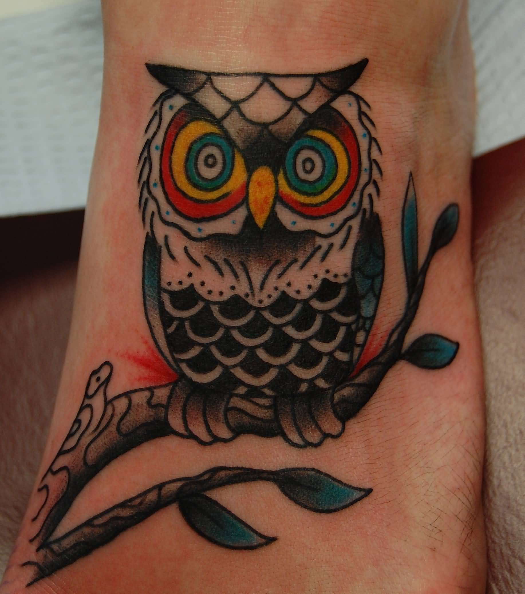 Traditional Hypnotic Owl Tattoo On Foot