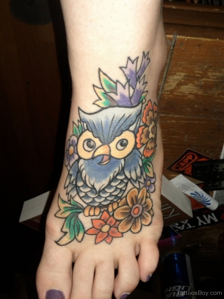 Traditional Owl With Flowers Tattoo On Foot