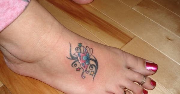 Tribal Colorful Butterfly Tattoo On Foot For Girls