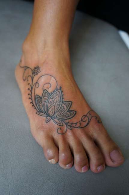 Tribal Lotus Flower Foot Tattoo