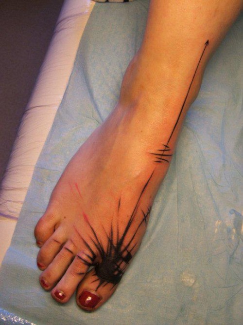 Unique Black Ink Splash Tattoo On Toe