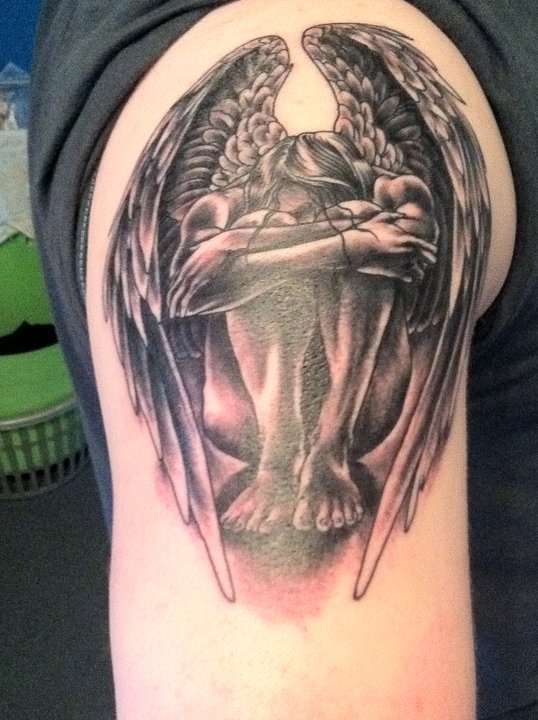 Weeping Angel Tattoo On Man Right Shoulder