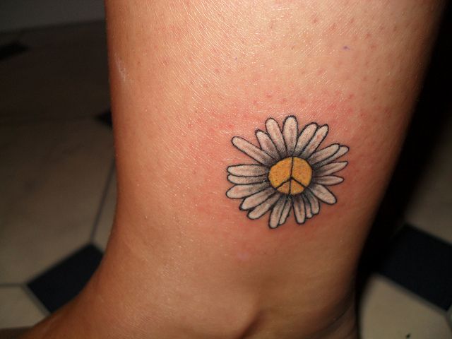 White Ink Daisy Flowers Tattoo On Ankle