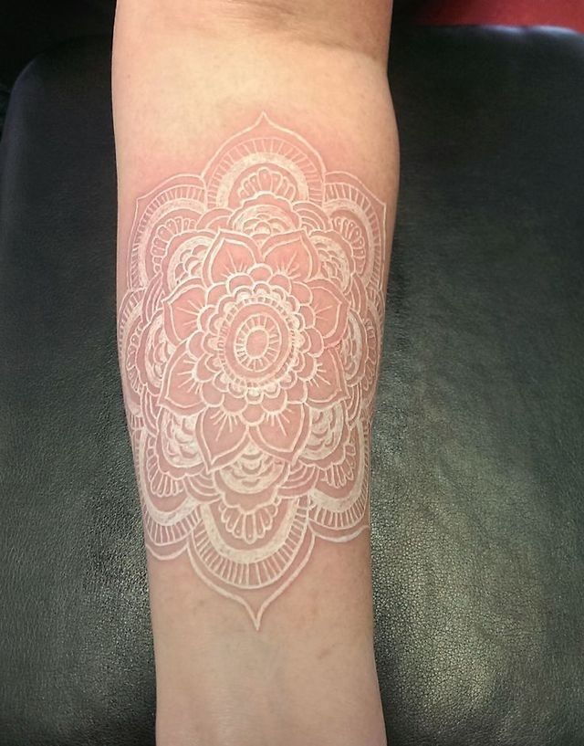 White Ink Mandala Flower Tattoo On Forearm
