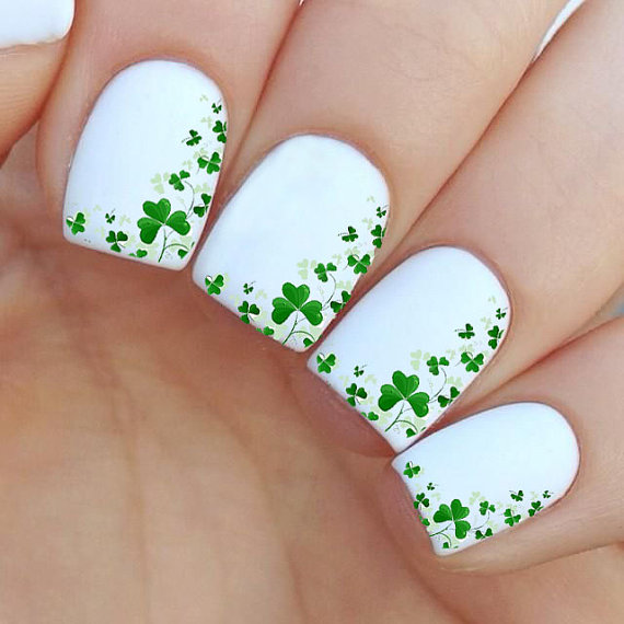 White Nails With Green Shamrock Leafs Saint Patrick's Day Nail Art