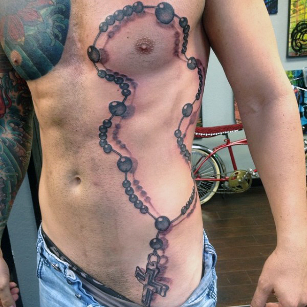 Wonderful 3D Rosary Tattoo On Chest And Rib Cage For Men