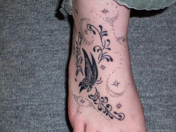 Wonderful Black Stars Butterfly Tattoo On Foot