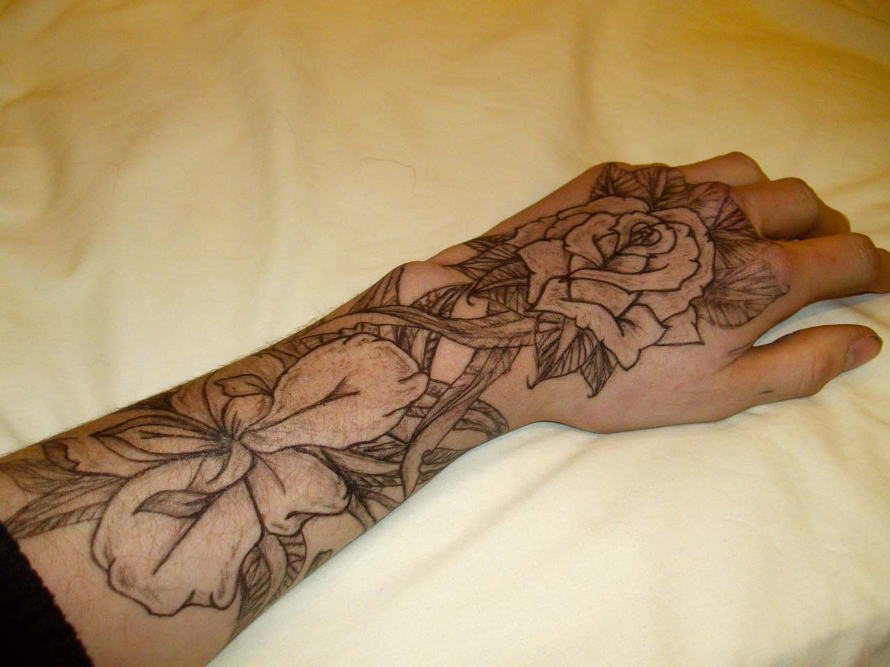 Wonderful Floral Hand Tattoo For Men