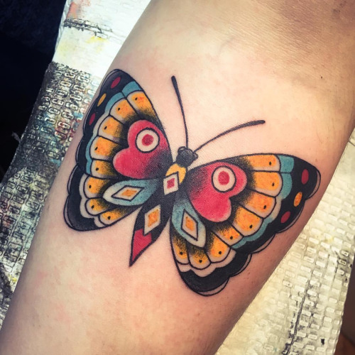 Wonderful Traditional Butterfly Tattoo On Forearm