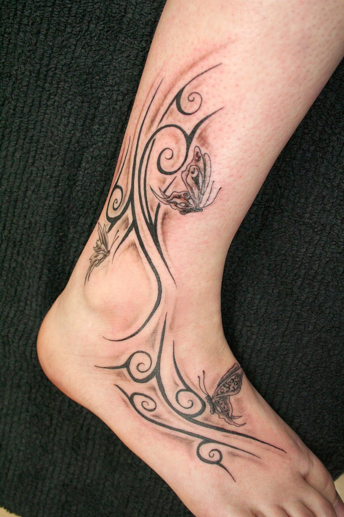 Wonderful Tribal Butterflies Tattoo On Ankle And Foot