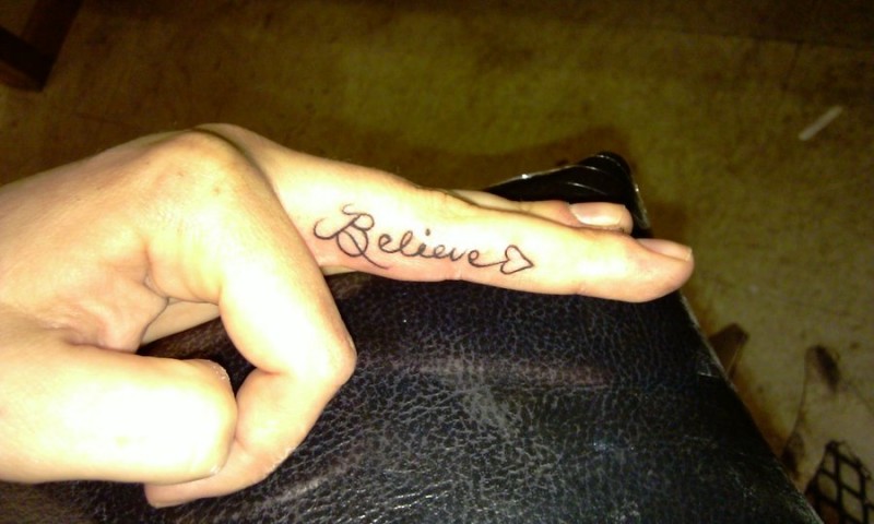 Word Believe In Love Tattoo On Finger