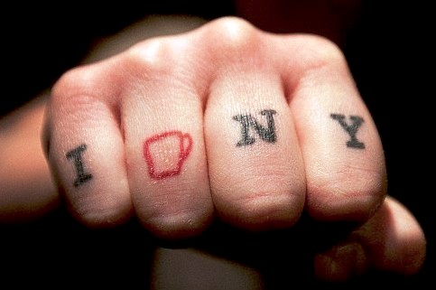 Words Cup Tattoo On Fingers
