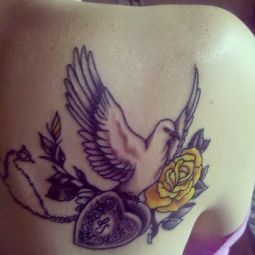 Yellow Rose Flower And Dove Tattoo On Chest