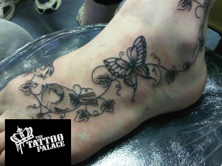 black Butterfly Vine Tattoo On Foot