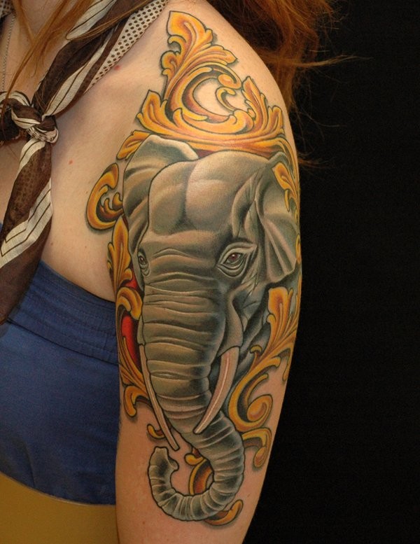 3D Asian Elephant Head In Frame Tattoo On Girl Left Shoulder