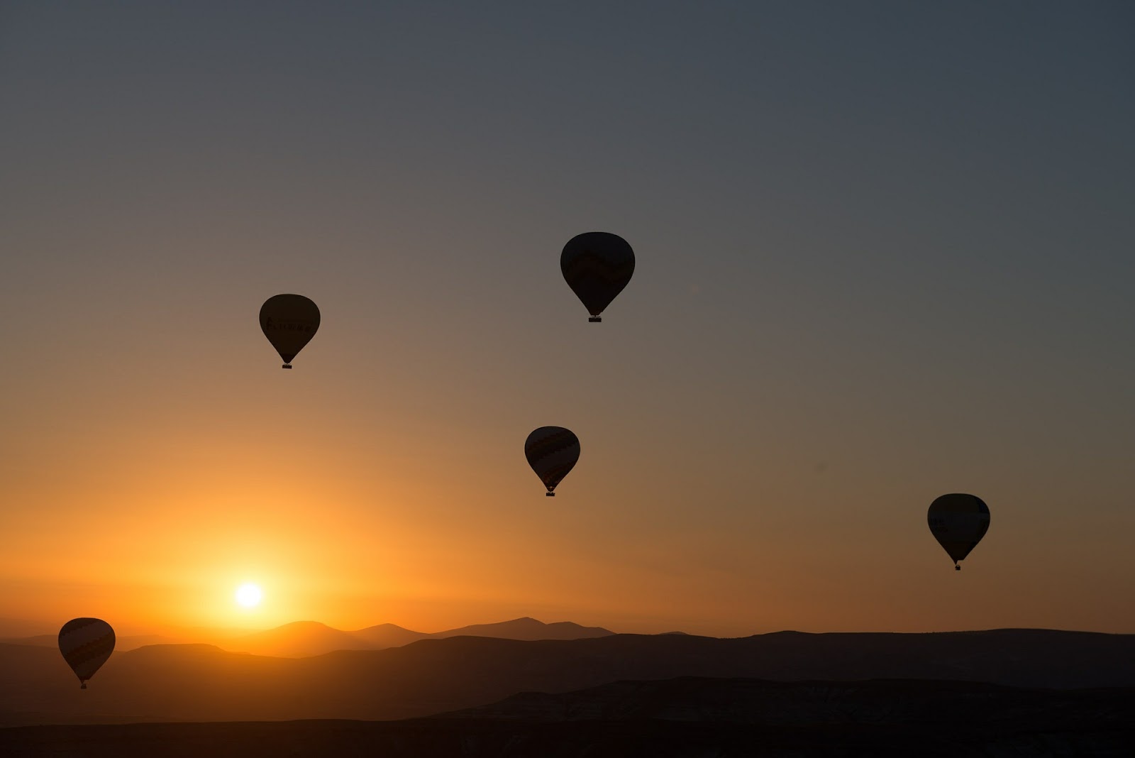 Air Balloons At Albuquerque Balloon Festival During Sunset