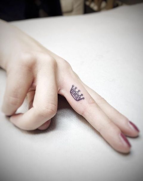 Amazing Crown Tattoo On Girl Side Finger