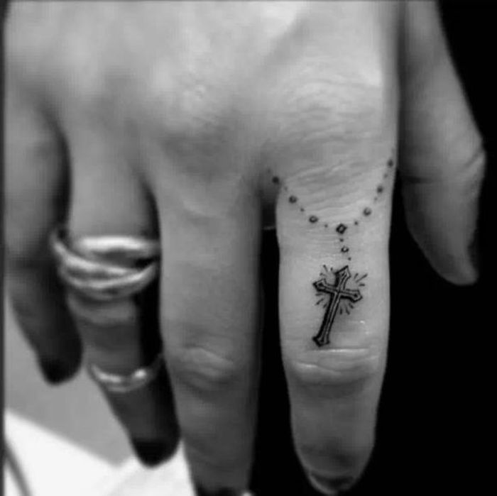 Amazing Rosary Cross Tattoo On Girl Right Finger