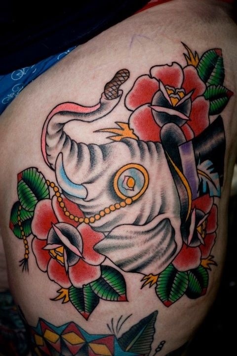 Amazing Traditional Elephant Head With Roses Tattoo Design For Thigh