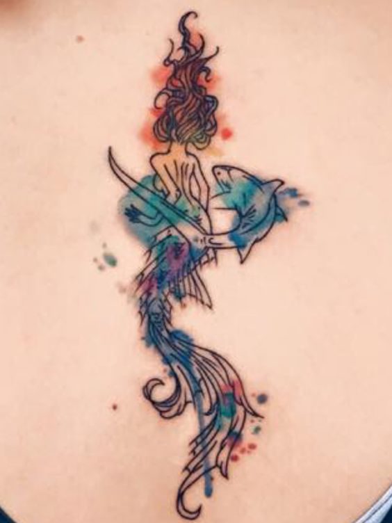Amazing Watercolor Mermaid Tattoo On Upper Back