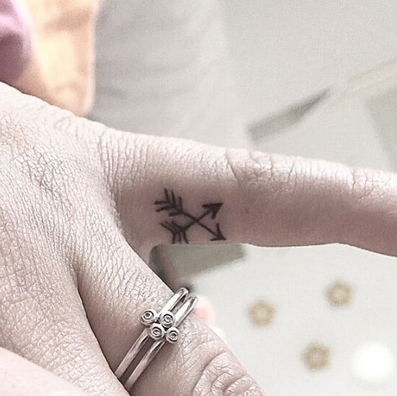 Arrow Tattoos On Side Finger