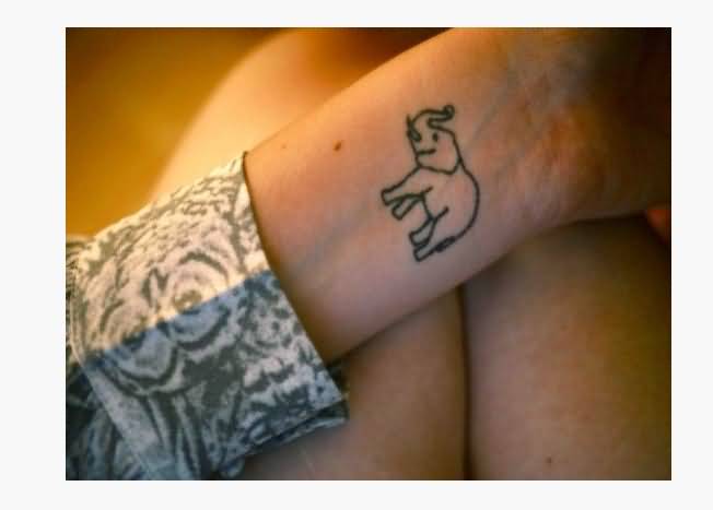 Attractive Black Outline Elephant Tattoo On Wrist