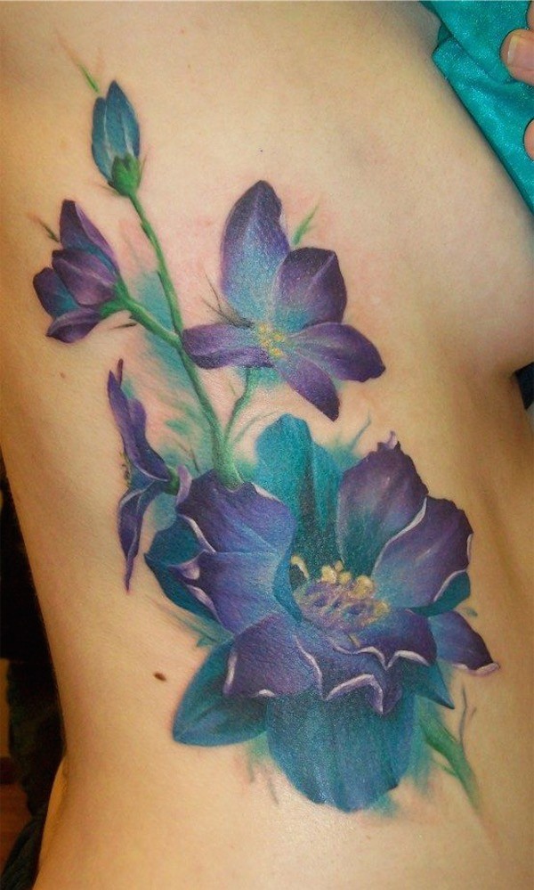 Attractive Colorful Rhododendron Flowers Tattoo On Girl Right Side Rib