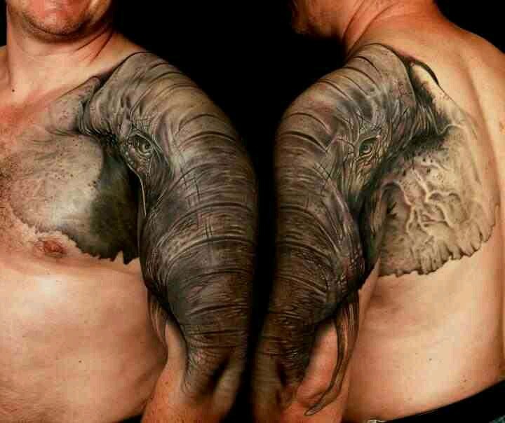 Attractive Elephant Head Tattoo On Man Left Half Sleeve