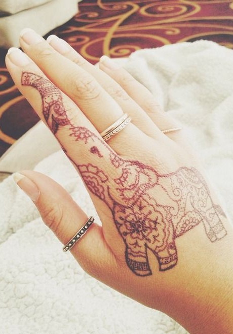 Attractive Elephant Tattoo On Girl Right Hand