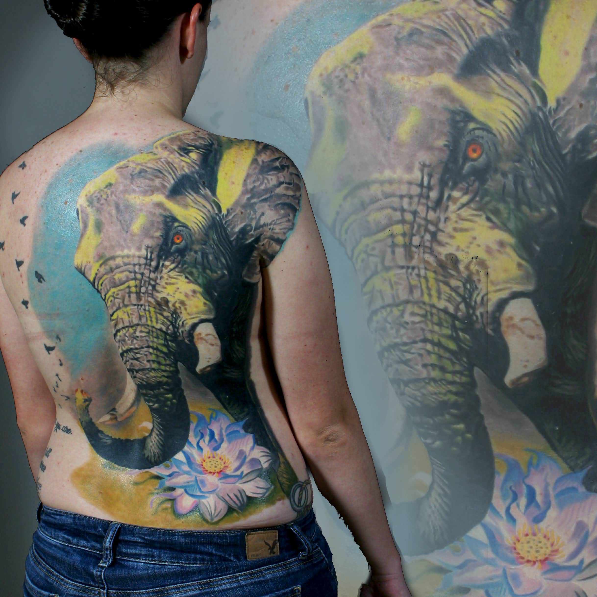Attractive Elephant With Lotus Flower Tattoo On Girl Full Back