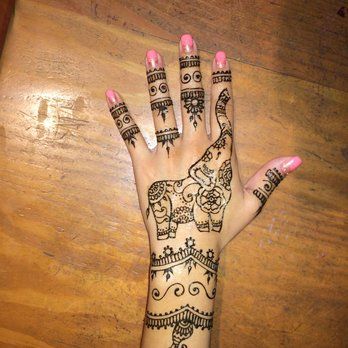 Attractive Henna Elephant Trunk Up Tattoo On Girl Left Hand