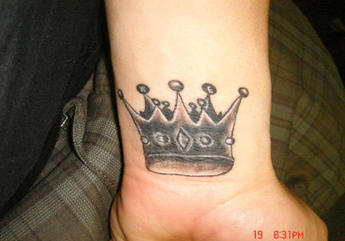 Awesome Black And Grey Crown Tattoo On Left Wrist