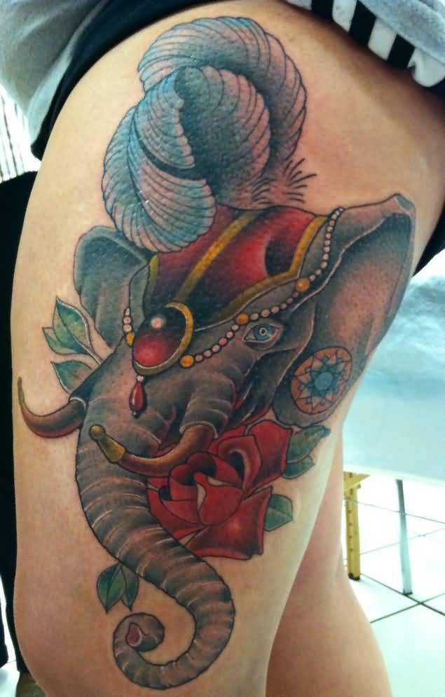 Awesome Circus Elephant Head With Rose Tattoo On Left Thigh