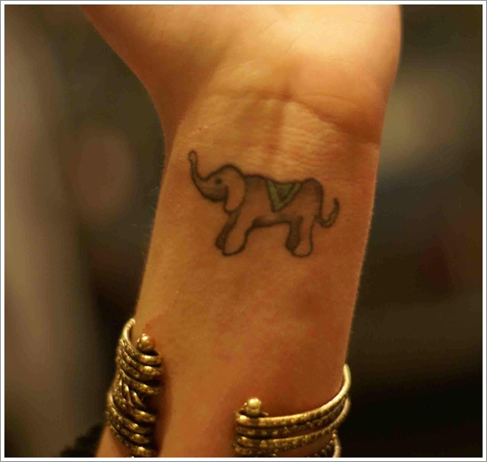 Awesome Elephant Trunk Up Tattoo On Left Wrist