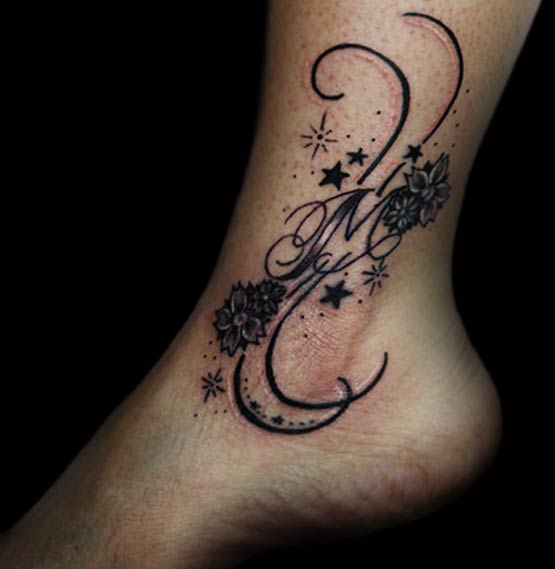 Awesome M Word With Flowers Tattoo On Ankle
