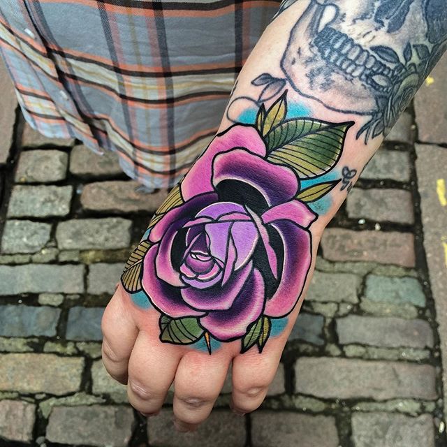Awesome Rose Tattoo On Left Hand
