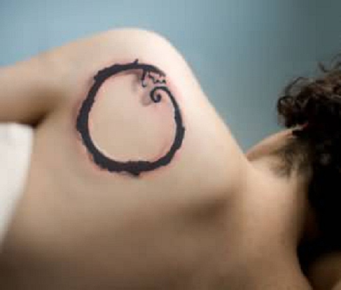 Awesome Zen Circle Tattoo On Left Back Shoulder