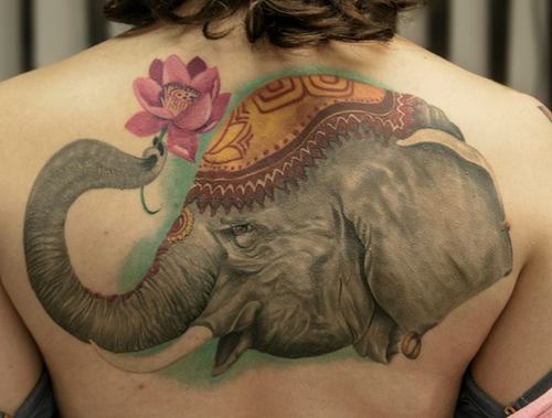 Beautiful Elephant Trunk Up With Lotus Flower Tattoo On Upper Back