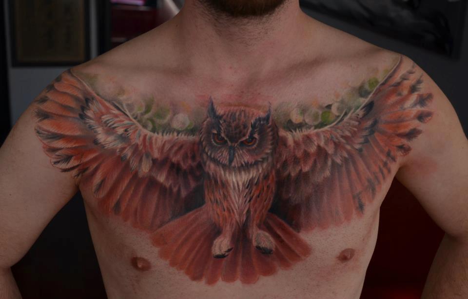 Beautiful Flying Owl Tattoo On Man Chest