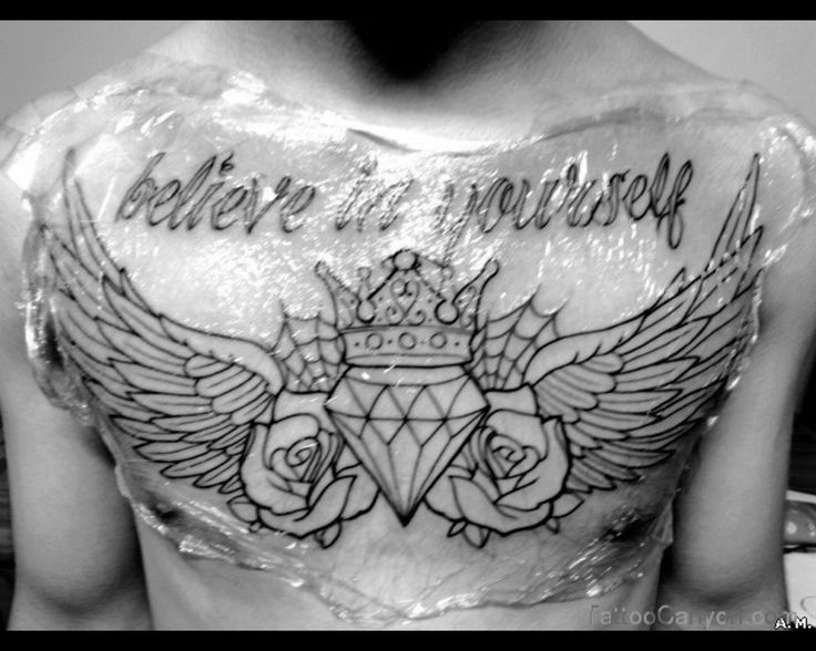 Believe In Yourself Winged Diamond Crown Tattoo On Chest