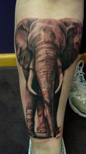 Black And Grey Chinese Elephant Tattoo On Leg