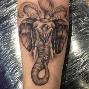 Black And Grey Circus Elephant Head Tattoo Design For Forearm