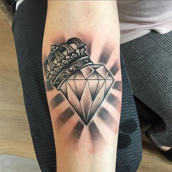 Black And Grey Diamond And Crown Tattoo On Forearm