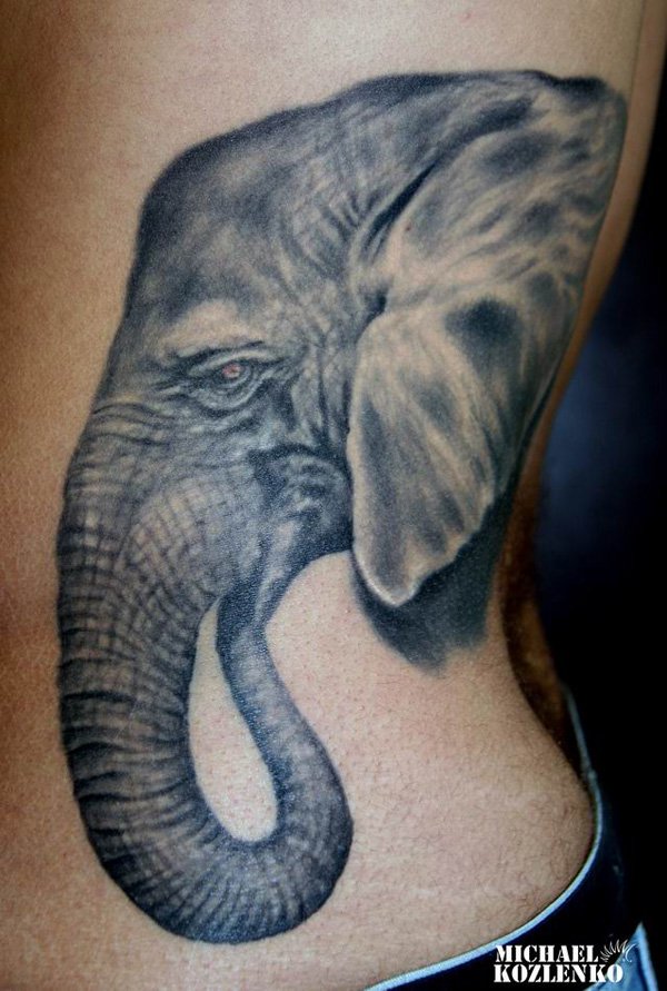 Black And Grey Elephant Head Tattoo On Left Side Rib